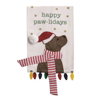 Decorative towel with a dog wearing a Santa hat and striped scarf, and 'happy paw-lidays' text.
