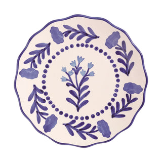 Decorative plate with blue floral patterns on a white background