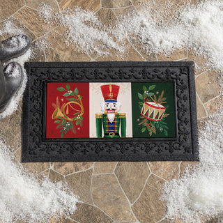 Christmas-themed decorative door mat with a nutcracker and drums design.