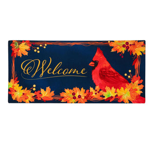 Decorative mat with a red cardinal and autumn leaves on a blue background