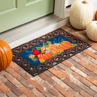Swapable doormat with pumpkins and a cardinal.