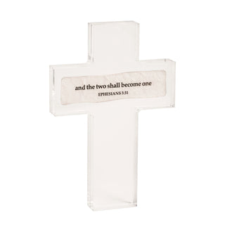 White cross with engraved text on a white background