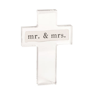 Decorative cross-shaped sign with 'mr. & mrs.' text on a white background