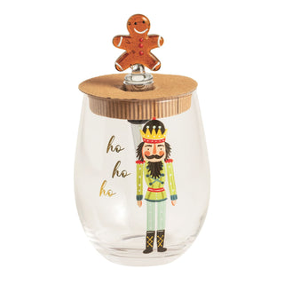 Clear glass container with wooden lid featuring a gingerbread man and nutcracker design.