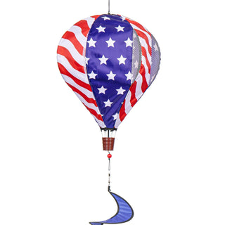 Decorative hot air balloon with American flag pattern on a white background
