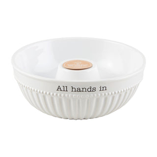 White bowl with text 'All hands in' on a white background