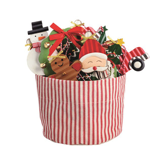 Decorative Christmas basket with festive figurines 