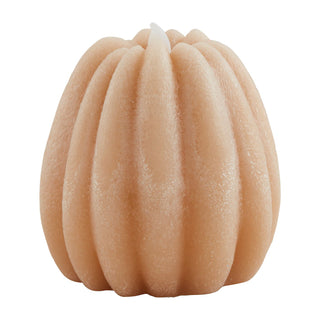 Beige decorative object resembling a pumpkin on a white background