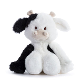 Plush cow toy with black and white pattern