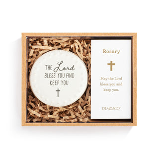 Decorative plate with 'The Lord Bless You and Keep You' text and a Rosary card in a wooden box.