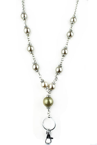 Lanyard with pearls and a clasp on a white background