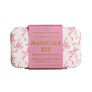 Essential Manicure Kit with pink and white design on a white background