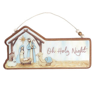 nativity scene ornament with 'Oh Holy Night'