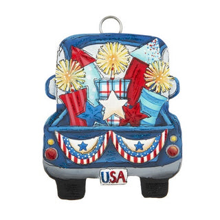 Round Top Charm shaped like a blue truck with patriotic elements on a white background