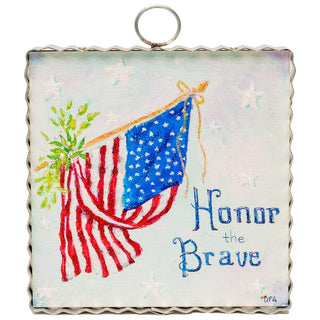 Decorative plaque with American flag and 'Honor the Brave' text on a light background