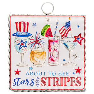 Keychain with patriotic design featuring glasses, stars, and stripes.