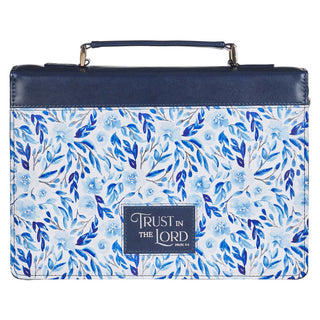Floral-patterned bag with 'Trust in the Lord' text on a white background