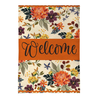 A rectangular decorative welcome mat or sign with a floral print and a wide central orange band featuring the word 'Welcome' in black script.