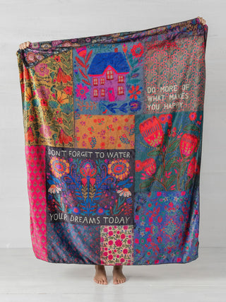 Colorful patchwork blanket with floral patterns