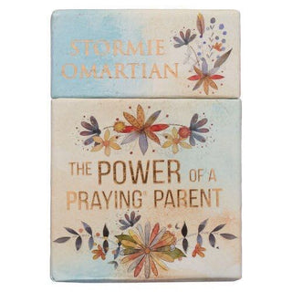 Book cover of 'The Power of a Praying Parent' by Stormie Omartian with floral designs on a white background.