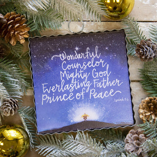 Decorative holiday plaque with Isaiah 9:6 text on it