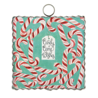 Decorative plaque with candy cane design and 'Candy Cane Wishes' tag on a turquoise background