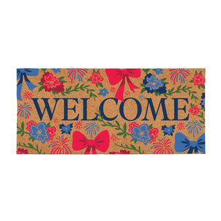 Decorative doormat with colorful floral and bow design and the word 'WELCOME'.