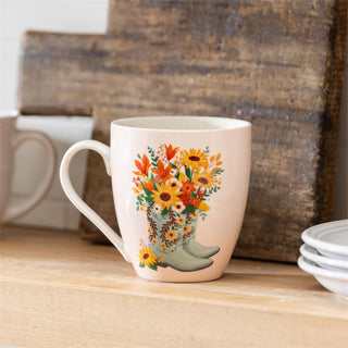 Mug with floral design on a wooden surface