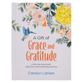 Book titled 'A Gift of Grace and Gratitude' with floral design and bird illustration on a white background