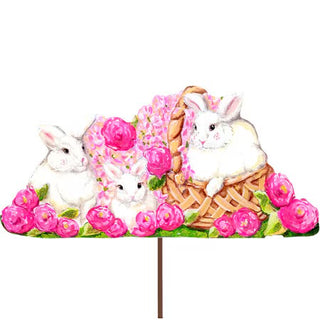 Decorative garden stake with three white rabbits and pink flowers on a white background