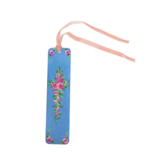 Floral bookmark on a blue background with a pink ribbon