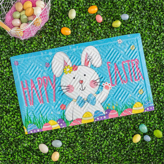 Easter-themed mat with a rabbit design on grass with Easter eggs.