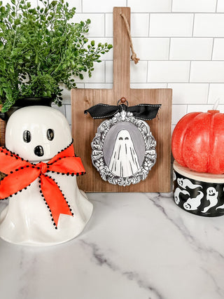 Charm with a vintage ghost