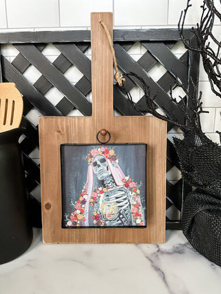 Halloween charms with skeleton surrounded by flowers and a veil