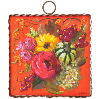 Decorative red charm with colorful flowers and berries