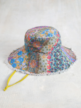 Colorful floral-patterned bucket hat on a white background
