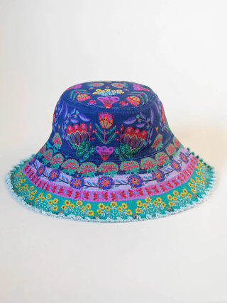 Colorful bucket hat with floral patterns on a white background