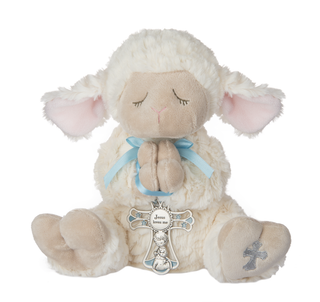 Plush lamb toy with a crib cross that has 'Jesus Loves Me'