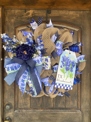 Wreath Mesh Bluebonnet w Bow	Bluebonnet mesh wreath – red, white, and blue deco mesh wreath with bluebonnet florals and a bow									