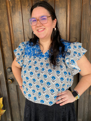 Blue and gray patterned blouse with embroidery 
