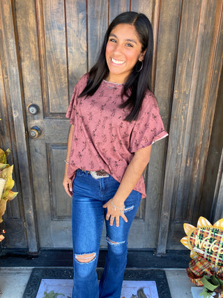 Deep red tee shirt with brown cowboy print 