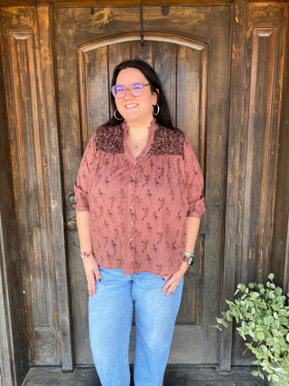 red and brown button up blouse with cowgirl print and brown embroidery