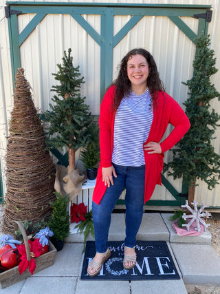 Loving this new red cardigan! It is soft, giving in fit, and just the perfect length