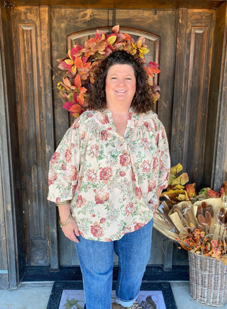 Celebrate the season in full bloom with this soft and feminine Fall Floral Blouse,