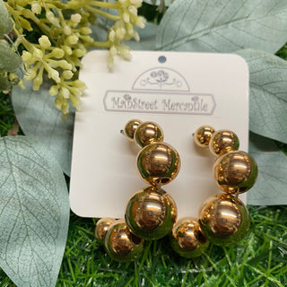Jumbo gold beaded earrings