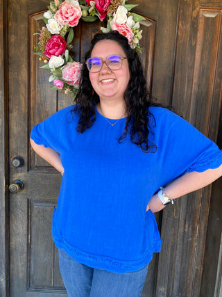 Meet your new warm-weather favorite: the Blue Linen Blend Fringe Top in a stunning cerulean hue