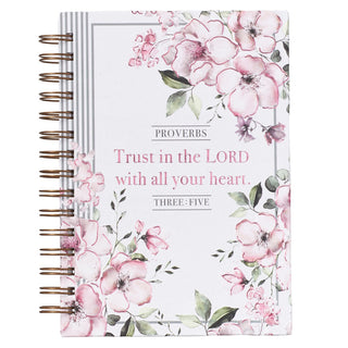 Notebook with floral design and Proverbs 3:5 quote on a white background