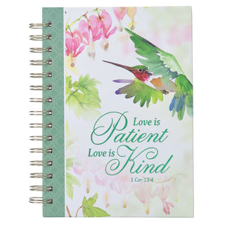 Notebook with a green cover featuring a hummingbird and floral design, with 'Love is Patient, Love is Kind' text.