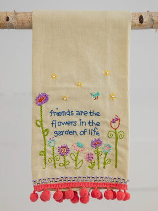 'frends are the flowers in the garden of life' text on a towel