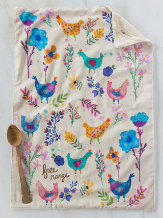 Colorful towel with chicken and floral pattern on a white background
